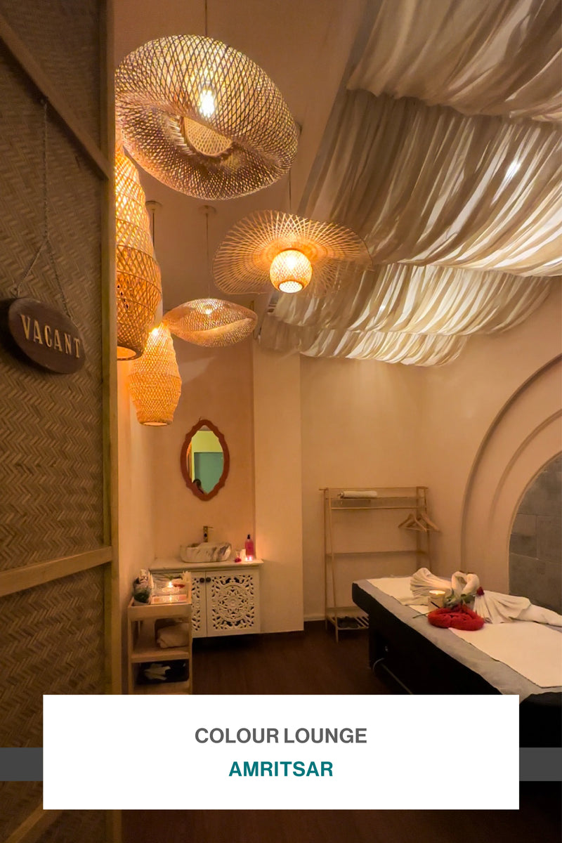 Algotherm spa treatment room featuring woven hanging lamps and a draped ceiling at Colour Lounge in Amritsar.